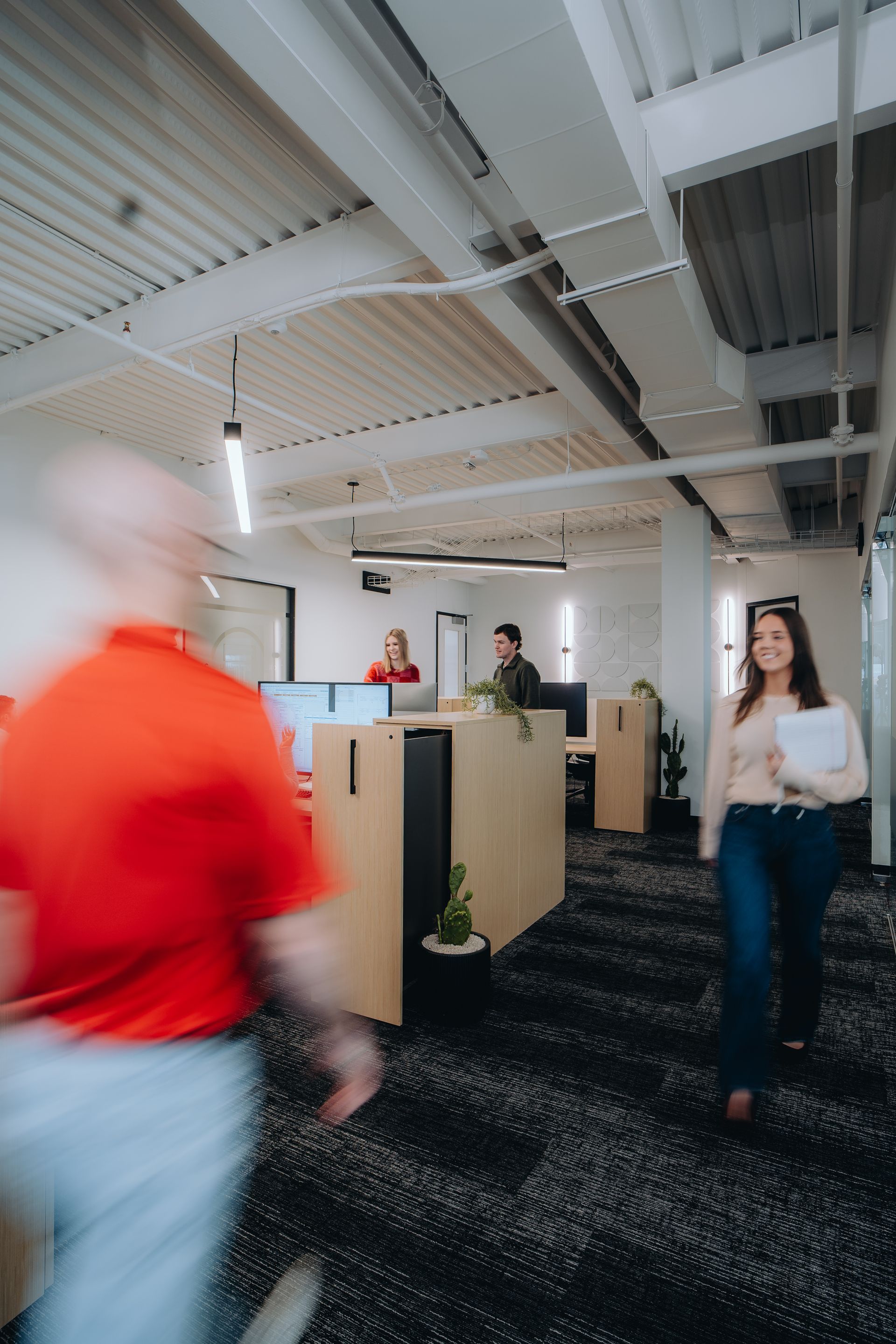 Texas Tech Credit Union staff at work in a bright, open office