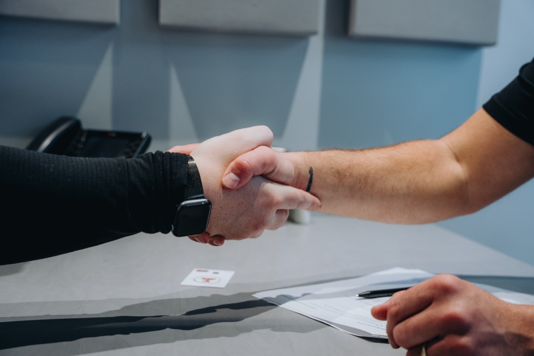 Members shaking hands