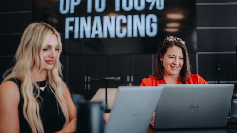 Texas Tech Credit Union mortgage officers with a member