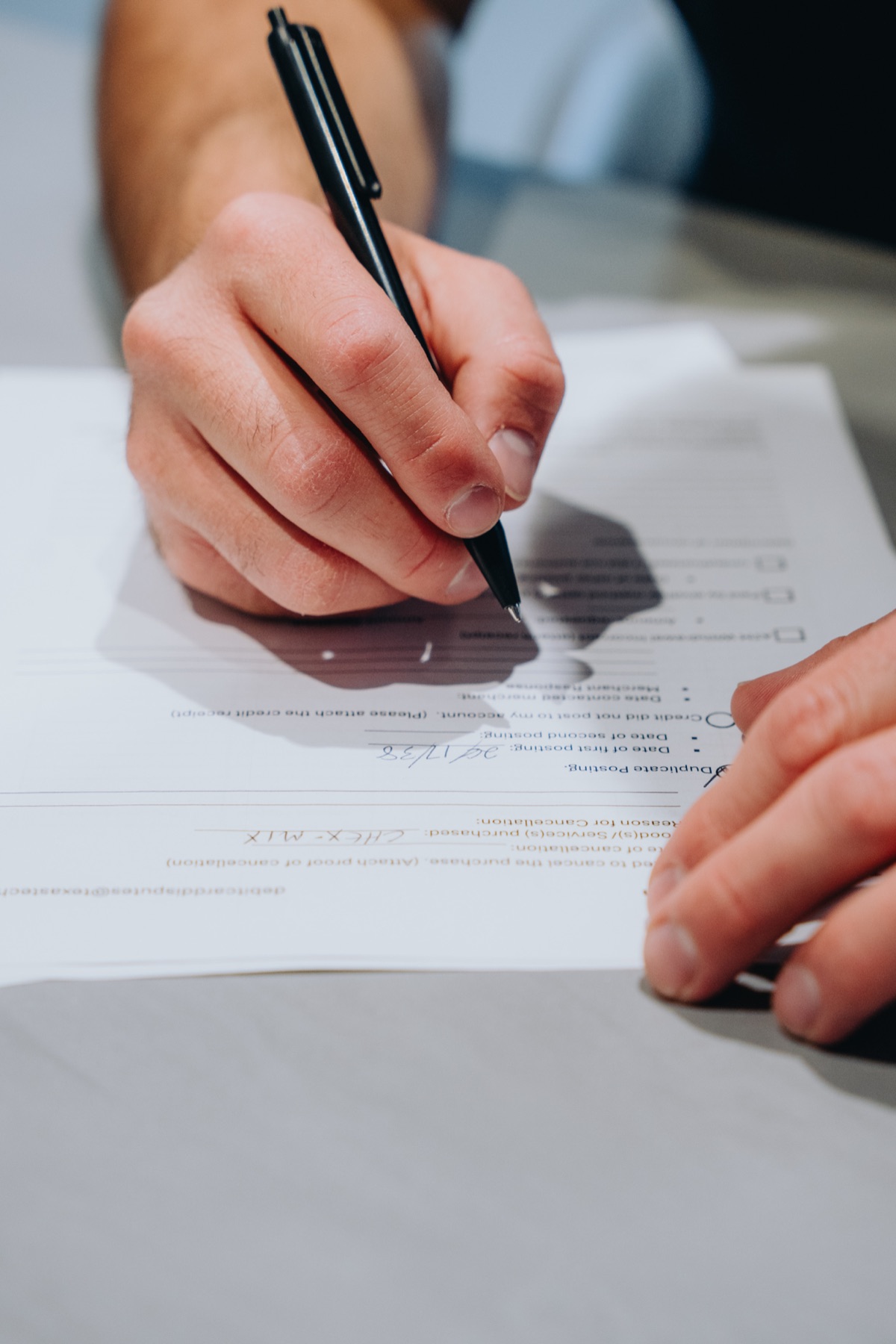Member signing loan documents